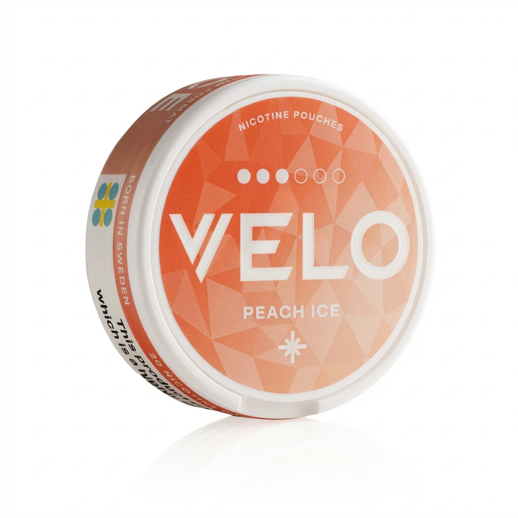 Round VELO Peach Ice Mini 6mg nicotine pouch tin with geometric peach lid and snowflake symbol on white background.