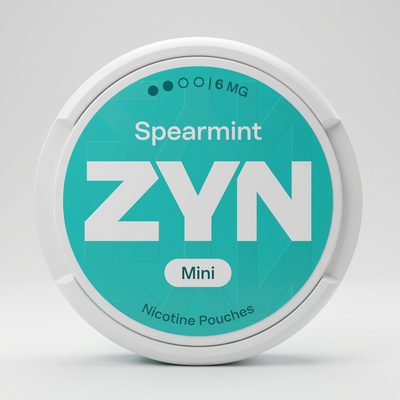 White ZYN Spearmint Mini 6MG nicotine pouch tin with a prominent teal label, displaying 'Spearmint ZYN Mini Nicotine Pouches'.